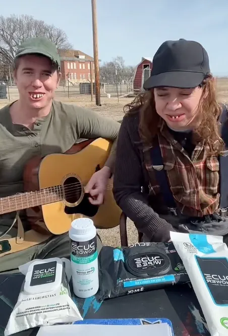 Buzz and Butch in a sponsored TikTok for Dude Wipes