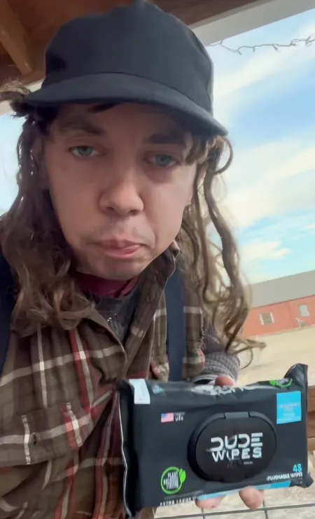 Buzz and Butch in a sponsored TikTok for Dude Wipes
