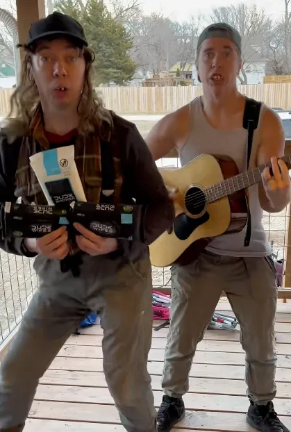 Buzz and Butch in a sponsored TikTok for Dude Wipes