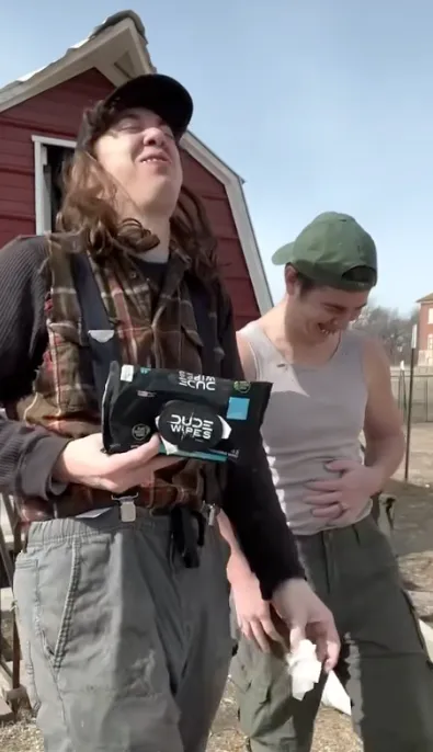 Buzz and Butch in a sponsored TikTok for Dude Wipes